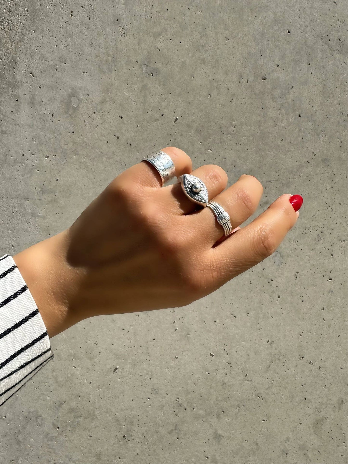 Anillos apilables: banda ancha, mal de ojo, nudo (knot)