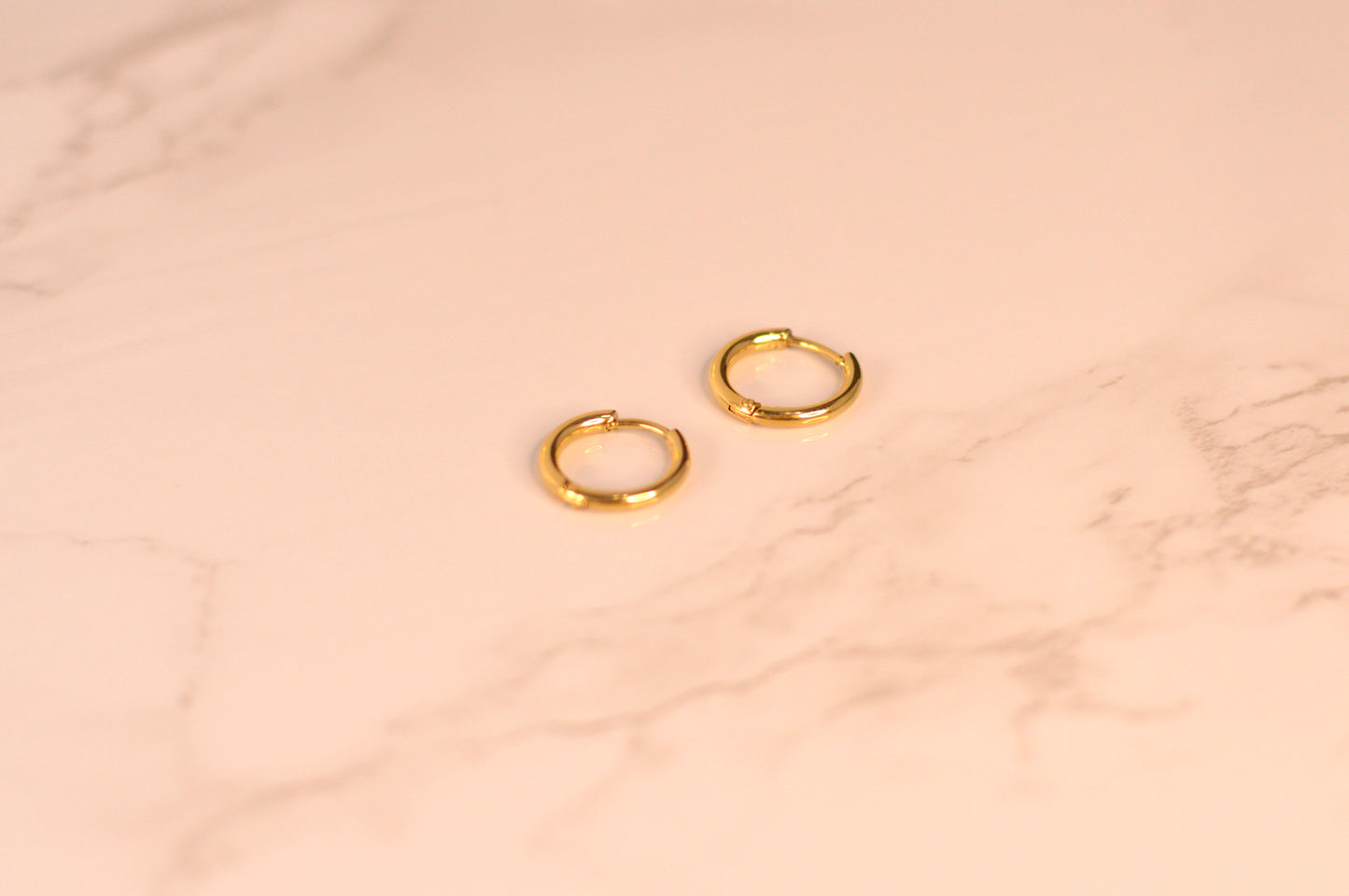 Pendientes de acero y acero chapado en oro
