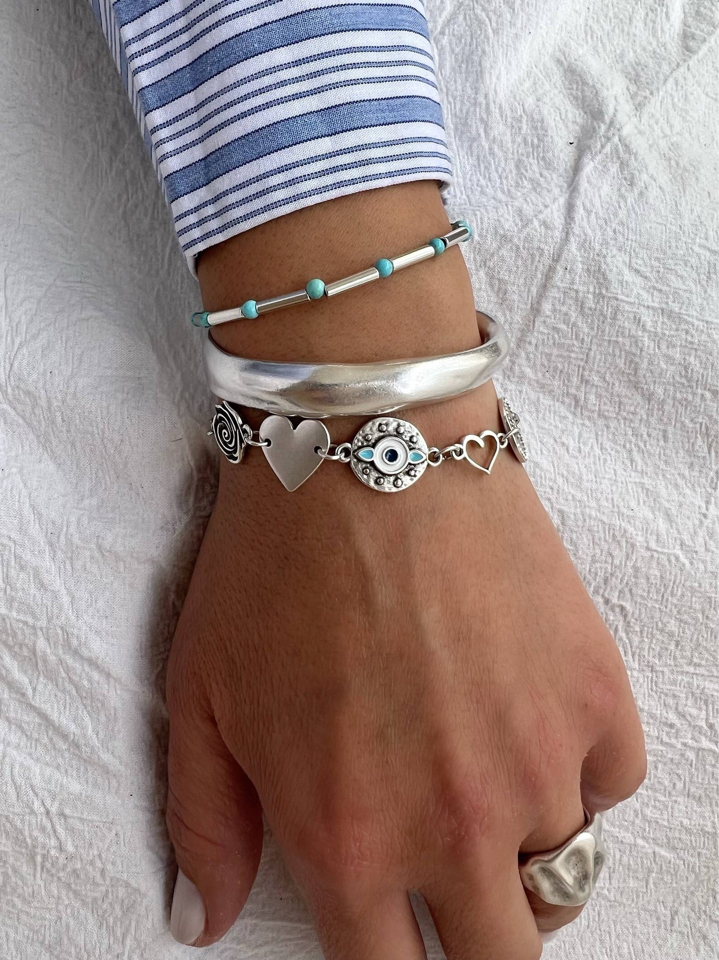 Pulsera triple de acero y plata