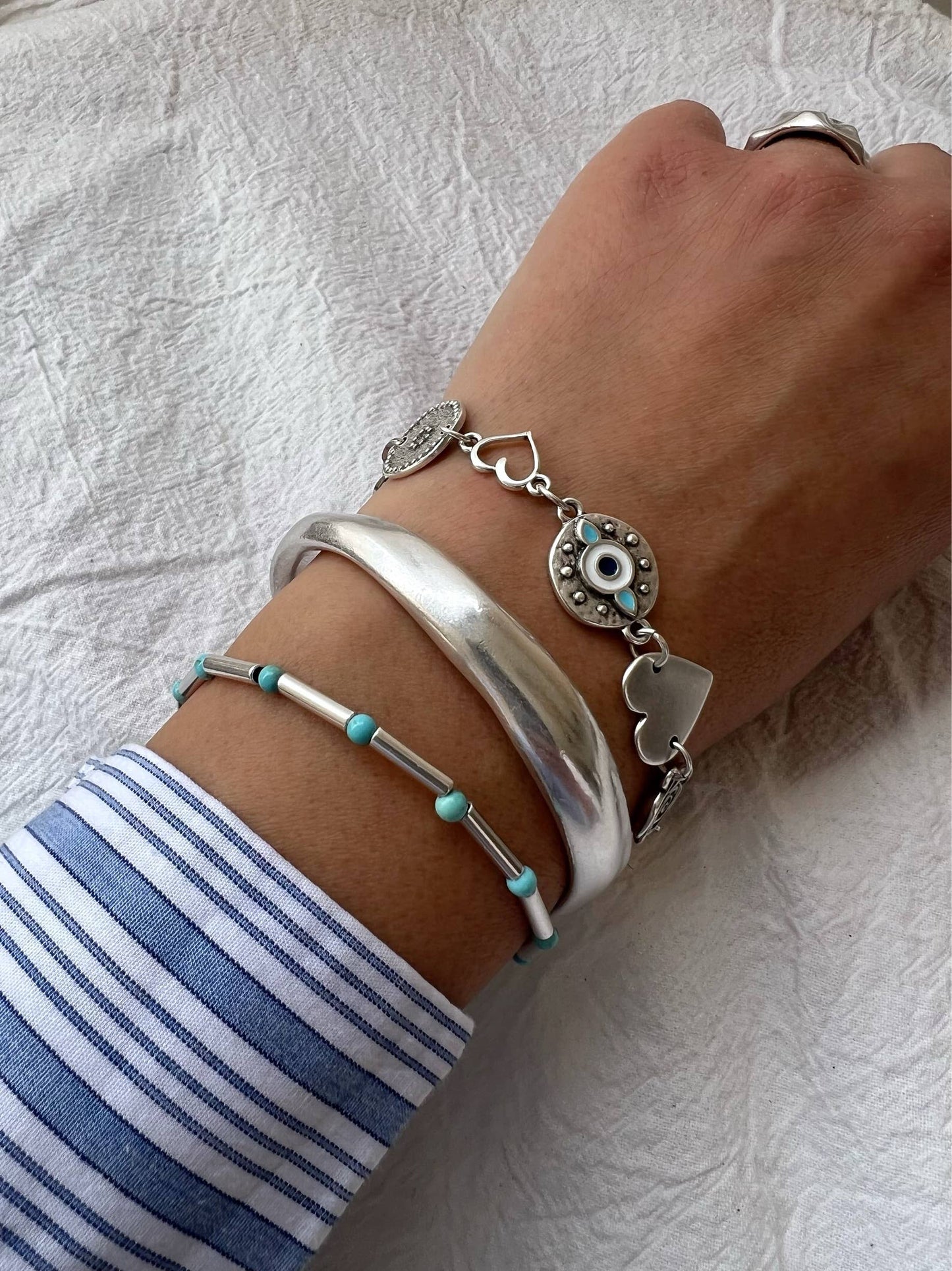 Pulsera triple de acero y plata