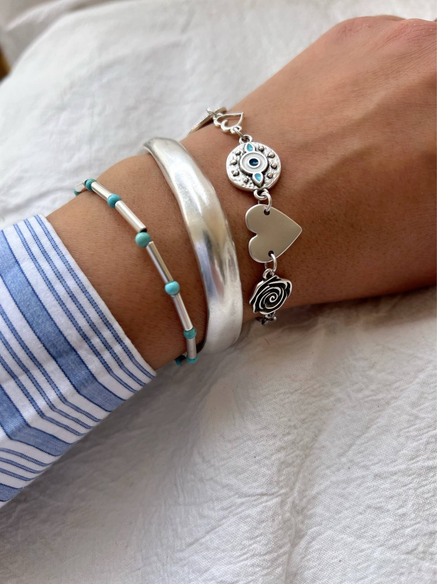 Pulsera triple de acero y plata